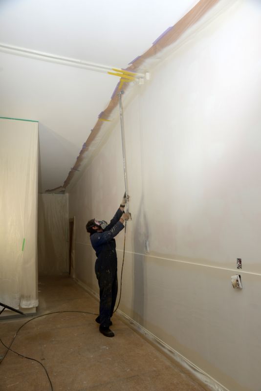Painting crew working on a ceiling